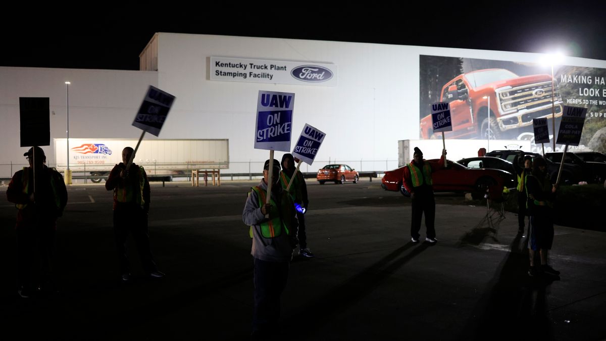 Factory workers and UAW union members form a picket line outside the Ford Motor Co. Kentucky Truck Plant in Louisville, Kentucky