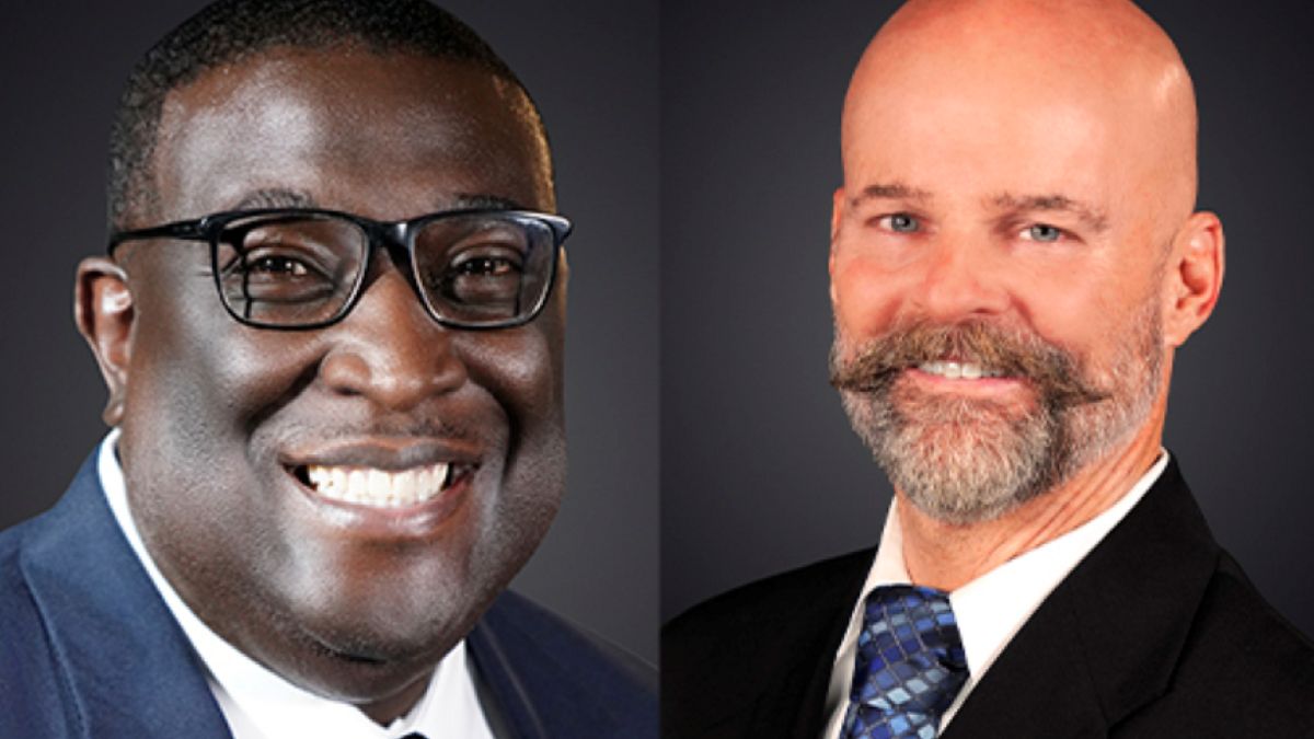 Headshots of two people in suits side-by-side.