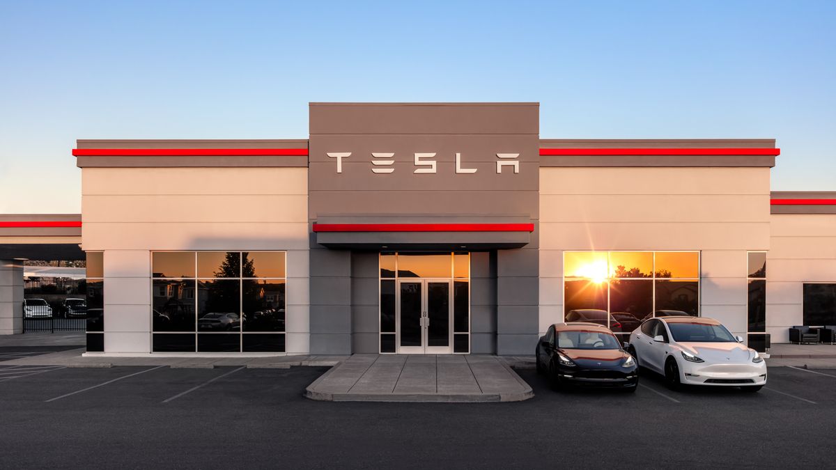An exterior view of a Tesla showroom.